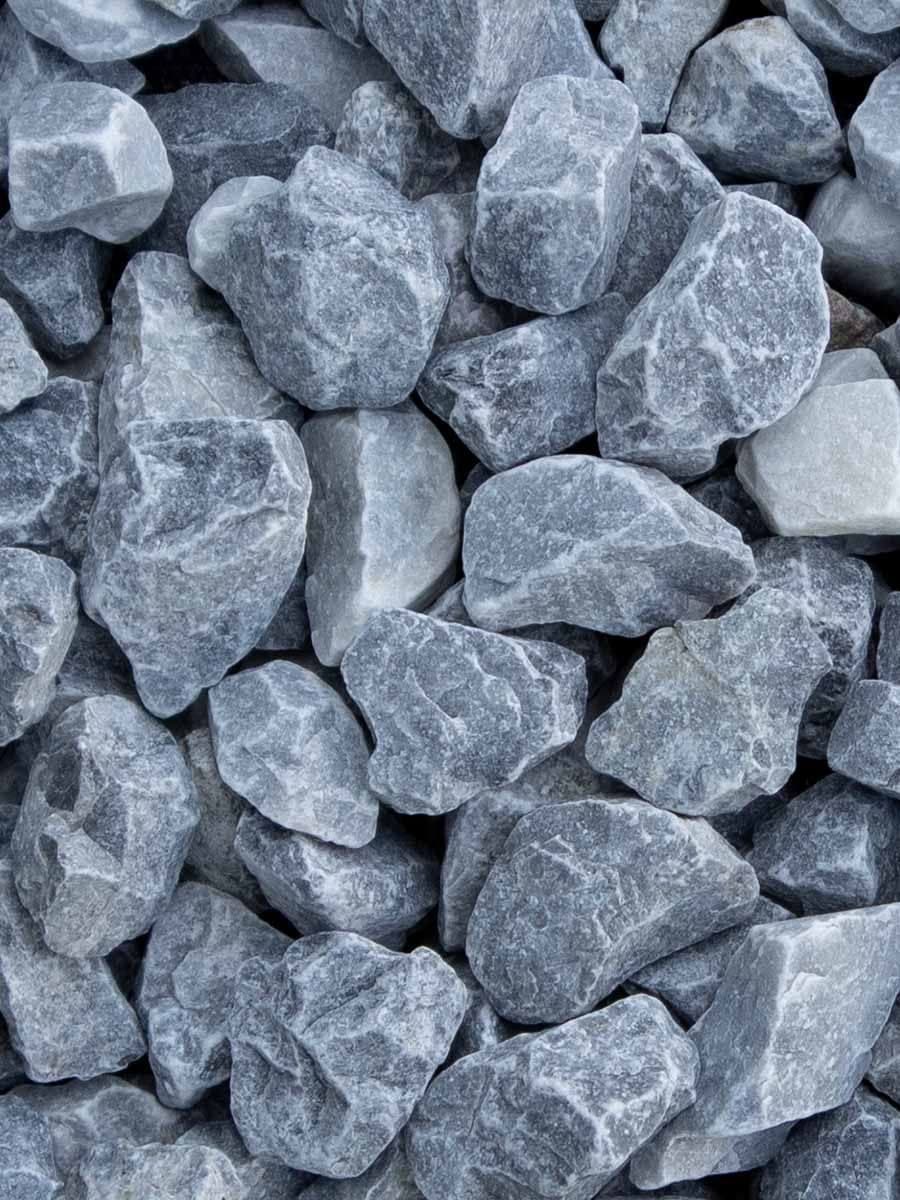 Crushed grey and white stone shot through with pale quartz veining